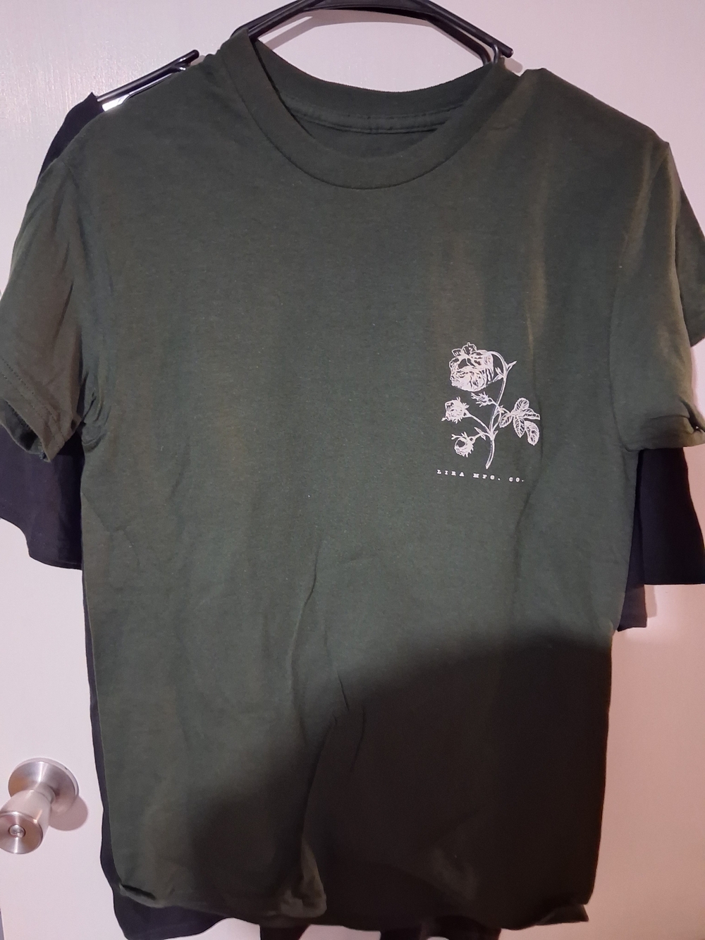 Lira Olive Green Short Sleeve Tee with White Floral Chest Graphic